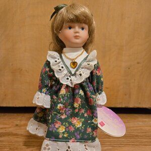 Russ Porcelain Doll of the Month - November Topaz